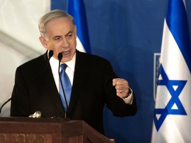 Israeli Prime Minister Benjamin Netanyahu delivers a speech during a swearing-in ceremony