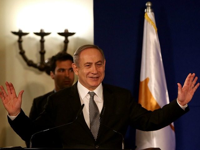 Israeli Prime Minister Benjamin Netanyahu delivers a speech during a trilateral meeting in