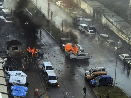 Cars burn after a car bomb explosion in Izmir, Turkey, Thursday, Jan. 5, 2017. An explosion believed to have been caused by a car bomb in front of a courthouse in the western Turkish city of Izmir on Thursday wounded several people, a local official said. Two of the suspected …