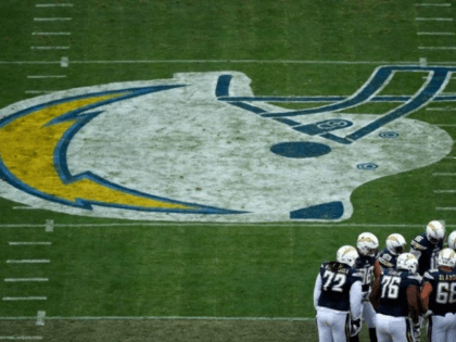 The offense of the San Diego Chargers, seen in huddle during a NFL game at Qualcomm Stadiu