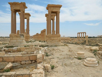 2830211 04/21/2016 The colonnade avenue and Tetrapylon in the historical part of Palmyra. Mikhail Voskresenskiy/Sputnik via AP