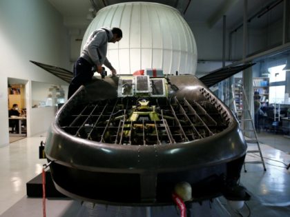 A worker works on a prototype of the Cormorant, a drone, at Urban Aeronautics' worksh