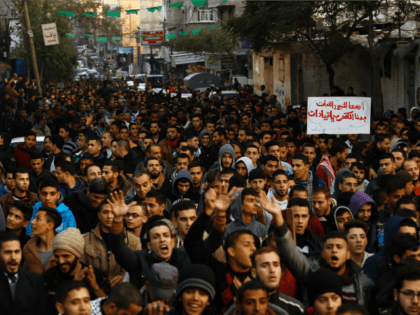 Palestinians chant slogans during a protest against the ongoing electricity crisis in Jabalia refugee camp in the northern Gaza Strip on January 12, 2017. Hamas security forces broke up a protest in the northern Gaza Strip Thursday, an AFP photographer and witnesses said, as thousands took to the streets over …