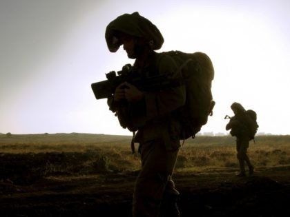 Israeli soldiers from the Golani Brigade take part in a military exercise in the Israeli-annexed Golan Heights near the border with Syria on June 26, 2013. The Golan Heights was seized by Israel from Syria in the 1967 Six Day War. AFP PHOTO/JACK GUEZ (Photo credit should read JACK GUEZ/AFP/Getty …