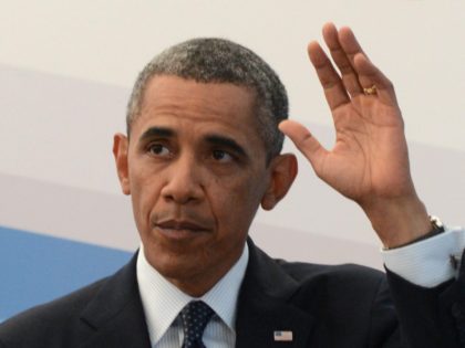 US President Barack Obama gestures during a press conference in Saint Petersburg on Septem