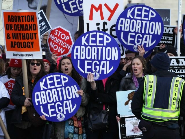 WASHINGTON, DC - JANUARY 22: Pro-choice activists shout slogans before the annual March fo
