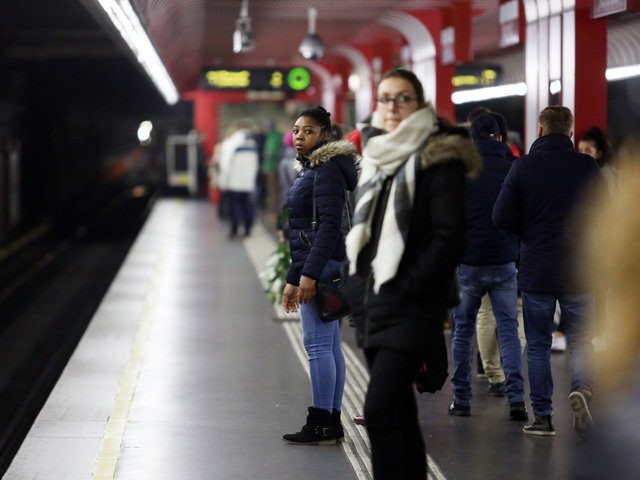 VIENNA, AUSTRIA - DECEMBER 01: A woman waits for subway at Reumannplatz station on Decembe