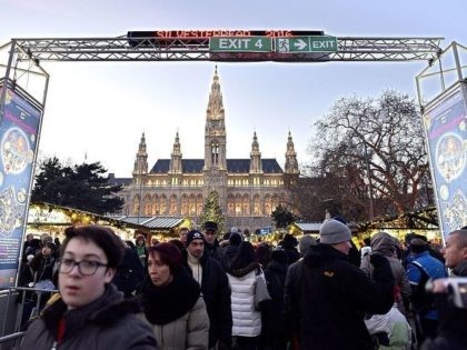Tourists and citizens take part in the New Year eve celebrations in Vienna, on December 31, 2016. / AFP / APA / HANS PUNZ / Austria OUT (Photo credit should read HANS PUNZ/AFP/Getty Images)
