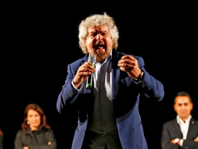 Beppe Grillo, the founder of the anti-establishment 5-Star Movement, talks during a march in support of the 'No' vote in the upcoming constitutional reform referendum in Rome