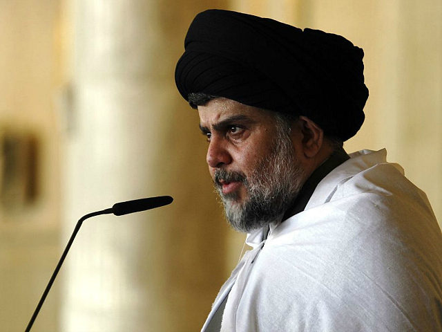 Iraqi Shiite cleric Moqtada al-Sadr delivers a speech to his supporters following Friday p