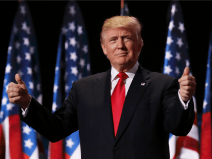 Republican presidential candidate Donald Trump gives two thumbs up to the crowd during the evening session on the fourth day of the Republican National Convention on July 21, 2016 at the Quicken Loans Arena in Cleveland, Ohio. Republican presidential candidate Donald Trump received the number of votes needed to secure …