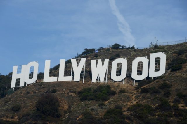 Each letter of the famed Hollywood sign in Los Angeles is 45 feet (13.7 meters) high, so changing it to read "Hollyweed," would have required not just bravado but considerable athleticism