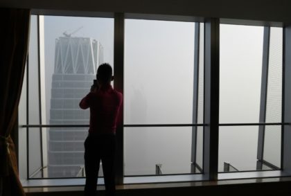 China's capital city started the year under a heavy blanket of grey smog, with a concentra