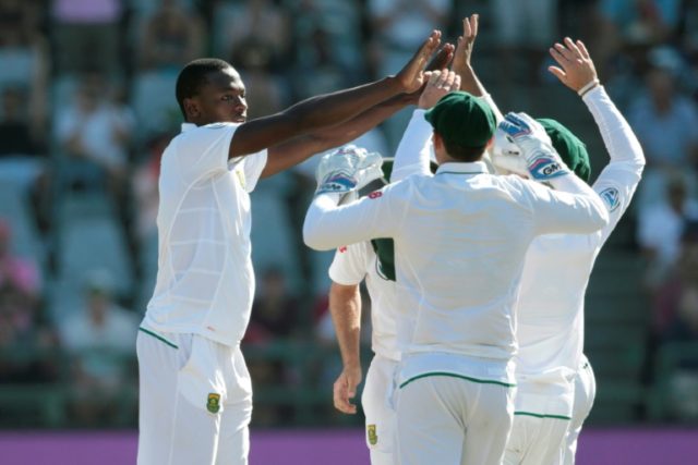 South African bowler Kagiso Rabada (L) celebrates the dismissal of a Sri Lanka batsman dur