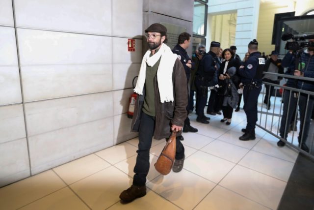 French farmer Cedric Herrou (L) is one of three people to appear before the courts in sout