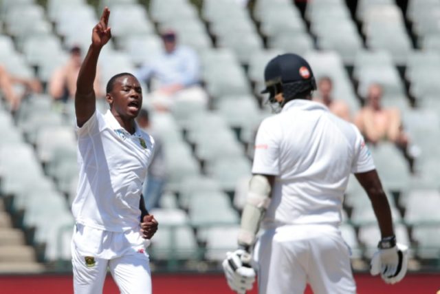 South African bowler Kagiso Rabada (L) celebrates the dismissal of Sri Lanka captain Angel