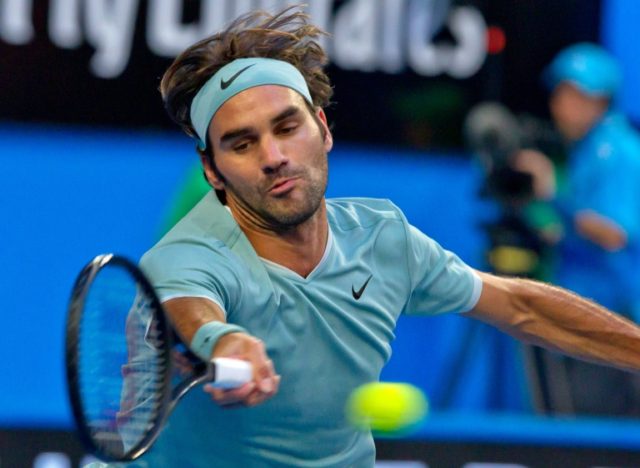 Switzerland's Roger Federer in action against Richard Gasquet of France at the Hopman Cup