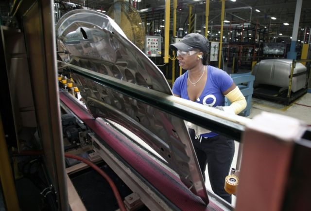 A Fiat Chrysler worker is seen at the FCA Sterling Stamping Plant on August 26, 2016 in St