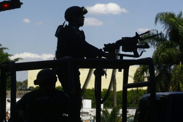 Mexican police patrol the streets of Guadalajara in 2015
