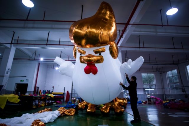 A golden mane and tiny wings that mimic his hand gestures -- the resemblence of inflatable