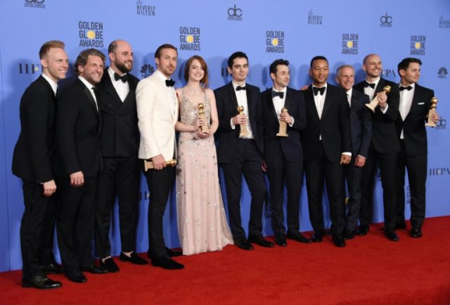 Cast and crew of "La La Land," winner of Best Motion Picture - Musical or Comedy, includin