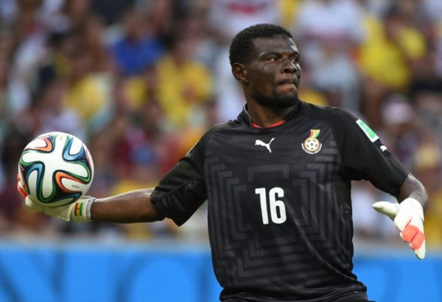 Ghana's goalkeeper Fatau Dauda preapres to throw the ball during a 2014 FIFA World Cup gam