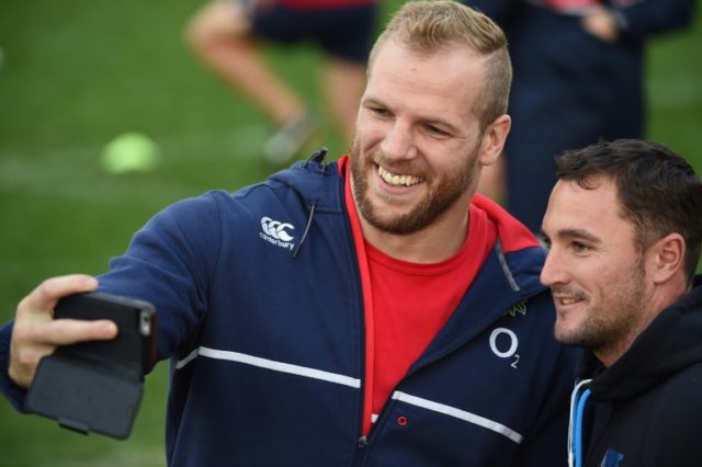 England rugby player James Haskell (L) has concussion which he suffered just 36 seconds in