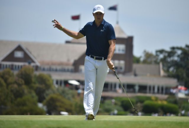 US golfer Jordan Spieth tees acknowledges the crowd at the Australian Open golf tournament