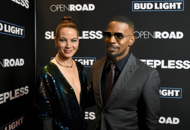 Michelle Monaghan and Jamie Foxx arrive at the premiere of Open Road Films' "Sleepless" in