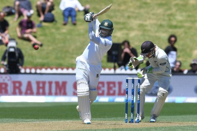 Bangladesh's Shakib Al Hasan bats watched by New Zealand's keeper BJ Watling on day two of