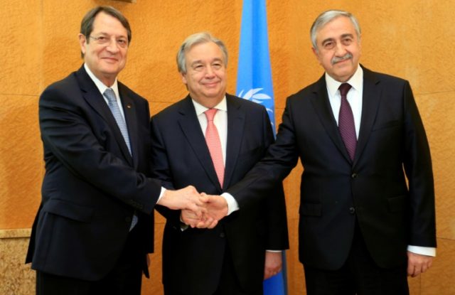 UN Secretary General Antonio Guterres (centre) flanked by Cypriot President Nicos Anastasi