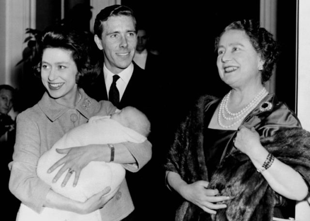 This file photo taken on December 1, 1961 shows Princess Margaret (L), holding her son Lin