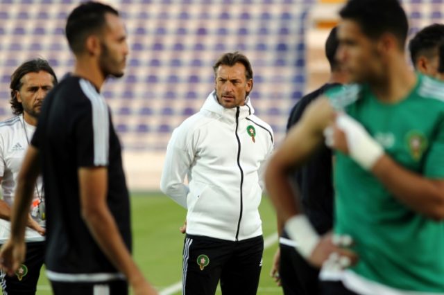 Morocco's French head coach Herve Renard (C) attends a training session with his players a