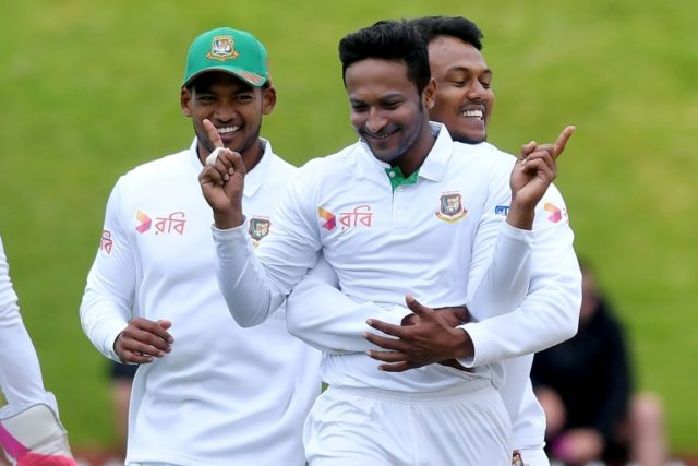 Bangladesh's Shakib Al Hasan (C) celebrates New Zealand's Tom Latham being caught with LBW
