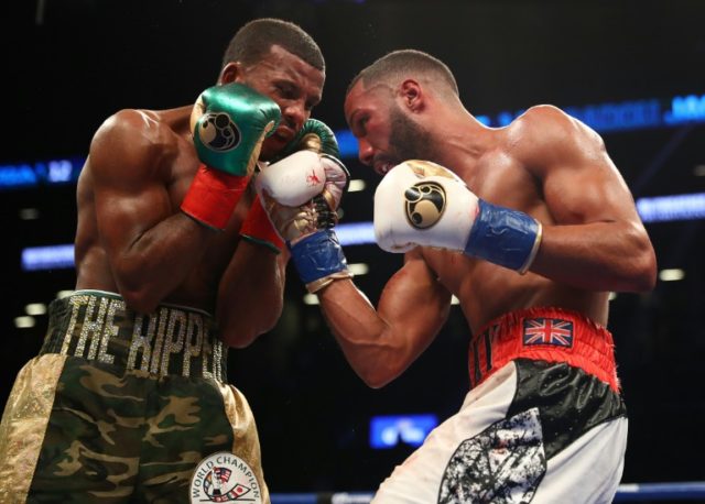 James DeGale punches Badou Jack during their WBC/IBF super-middleweight unification bout a