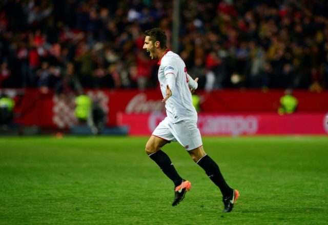 Sevilla's forward Stevan Jovetic celebrates after scoring their 2-1 victory goal during th