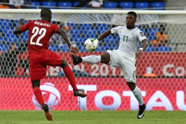 Togo's midfielder Ihlas Bebou (L) challenges Ivory Coast's defender Serge Aurier on Januar
