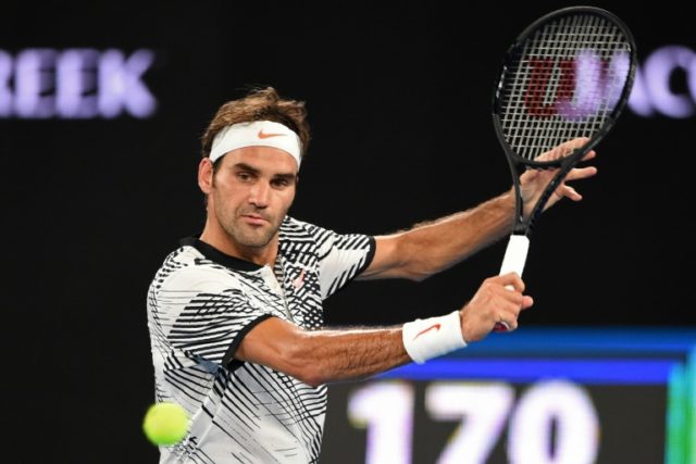 Switzerland's Roger Federer in action against Jurgen Melzer of Austria in the Australian O