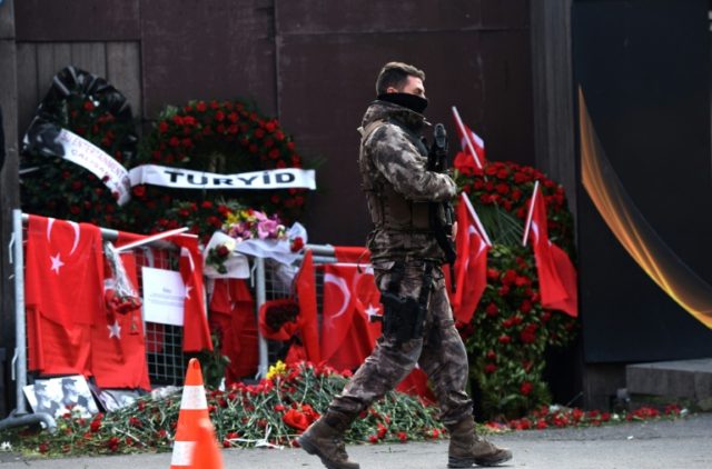 Turkish special forces police patrol in front of the Reina nightclub in Istanbul, where a