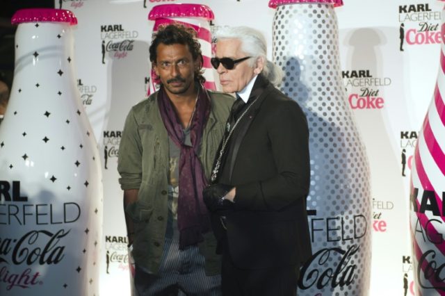 French Colombian-born designer Haider Ackermann (L), pictured with Karl Lagerfeld (R) in 2