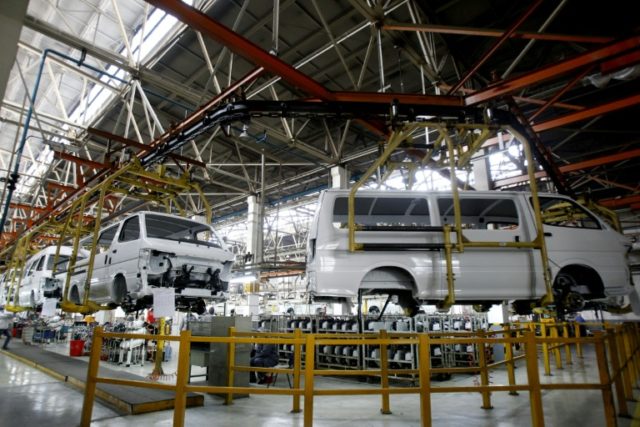 Cars are assembled in a workshop of an automobile factory in Shenyang, northeast China's L