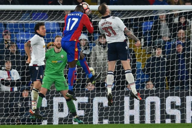 Crystal Palace's striker Christian Benteke (2nd R) jumps to head their first goal during t
