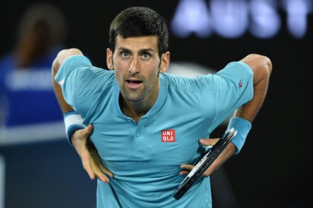 Serbia's Novak Djokovic celebrates victory against Fernando Verdasco of Spain in the first