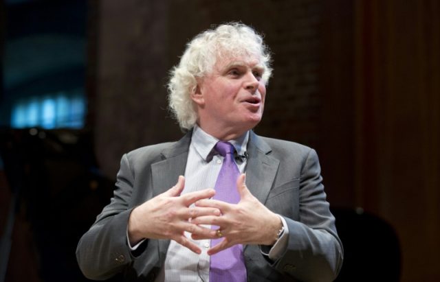 The London Symphony Orchestra's Music Director Designate, Simon Rattle, speaks during a pr