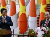 Vietnam's Prime Minister Nguyen Xuan Phuc (right) and his Japanese counterpart Shinzo Abe at a joint press briefing in Hanoi on January 16, 2017 Vietnam's Prime Minister Nguyen Xuan Phuc (right) and his Japanese counterpart Shinzo Abe at a joint press briefing in Hanoi on January 16, 2017