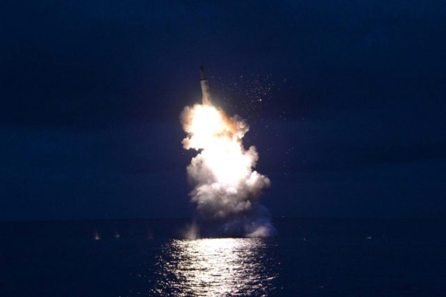 North Korea test-fires a strategic submarine-launched ballistic missile at an undisclosed