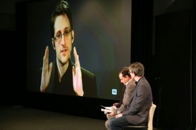 Edward Snowden speaks via videolink during Politicon at the Los Angeles Convention Center