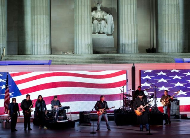 Country singer Toby Keith (2R) performs for US President-elect Donald Trump and his family