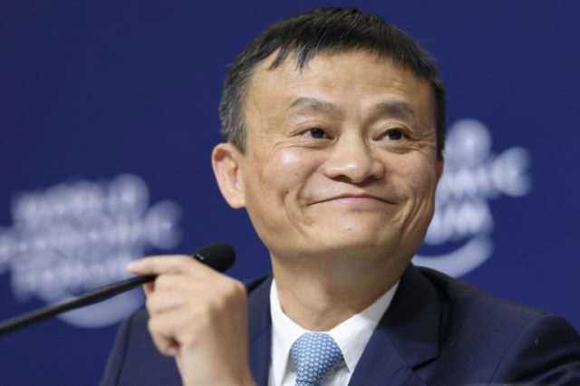 Alibaba Group Founder and Executive Chairman China's Jack Ma attends the announcement of a