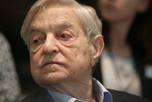 Billionaire George Soros calls Donald Trump a "would-be-dictator" and says he is "gearing